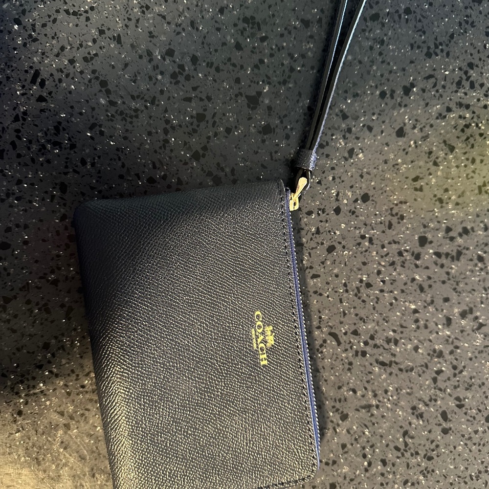 Dark navy blue coach wristlet